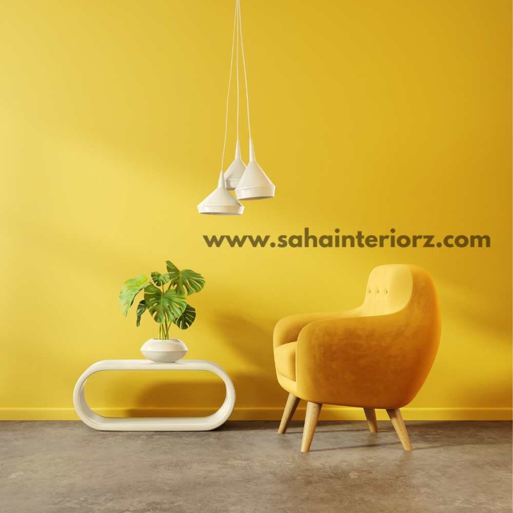 Stylish living space with a yellow accent wall, a mustard armchair, and modern lighting.